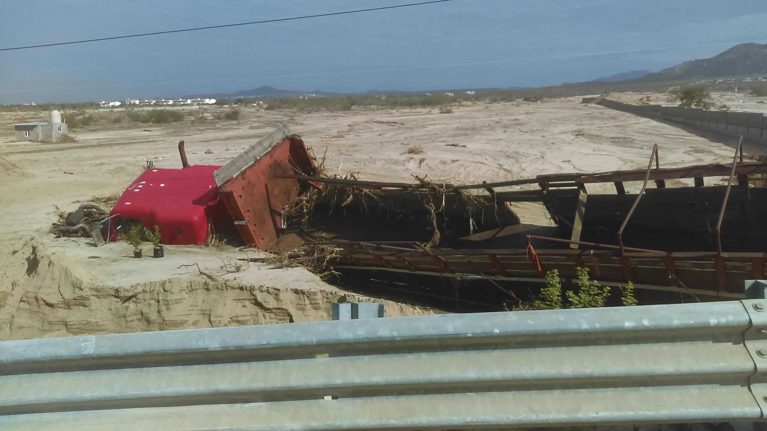 truck buried in mudslides